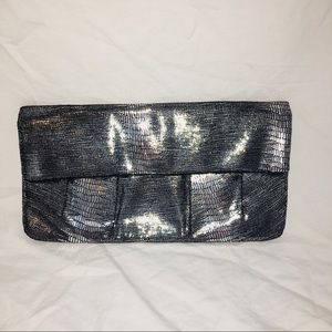 Metallic gunmetal clutch